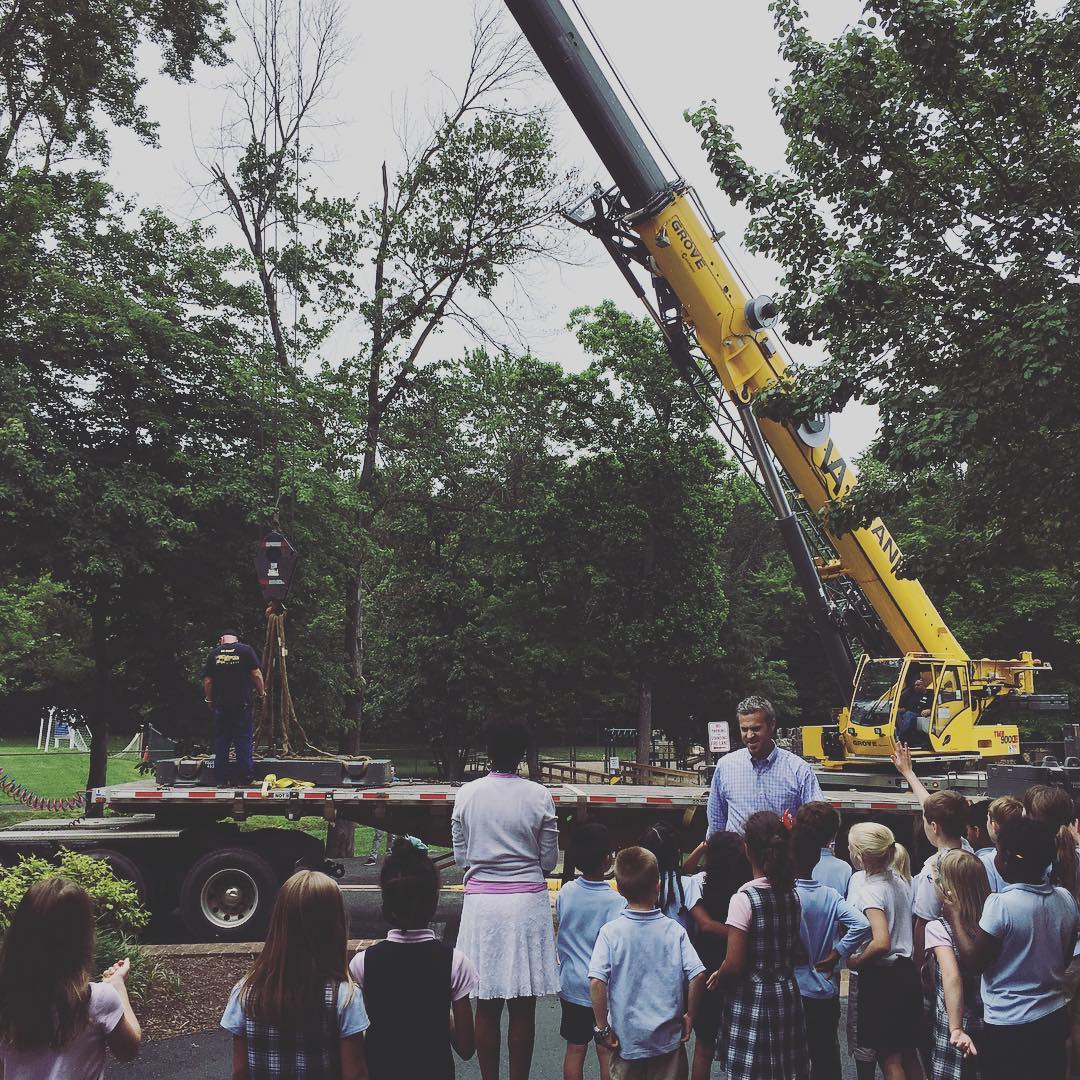 Kindergarteners came out to watch the “cool crane that holds 100lbs