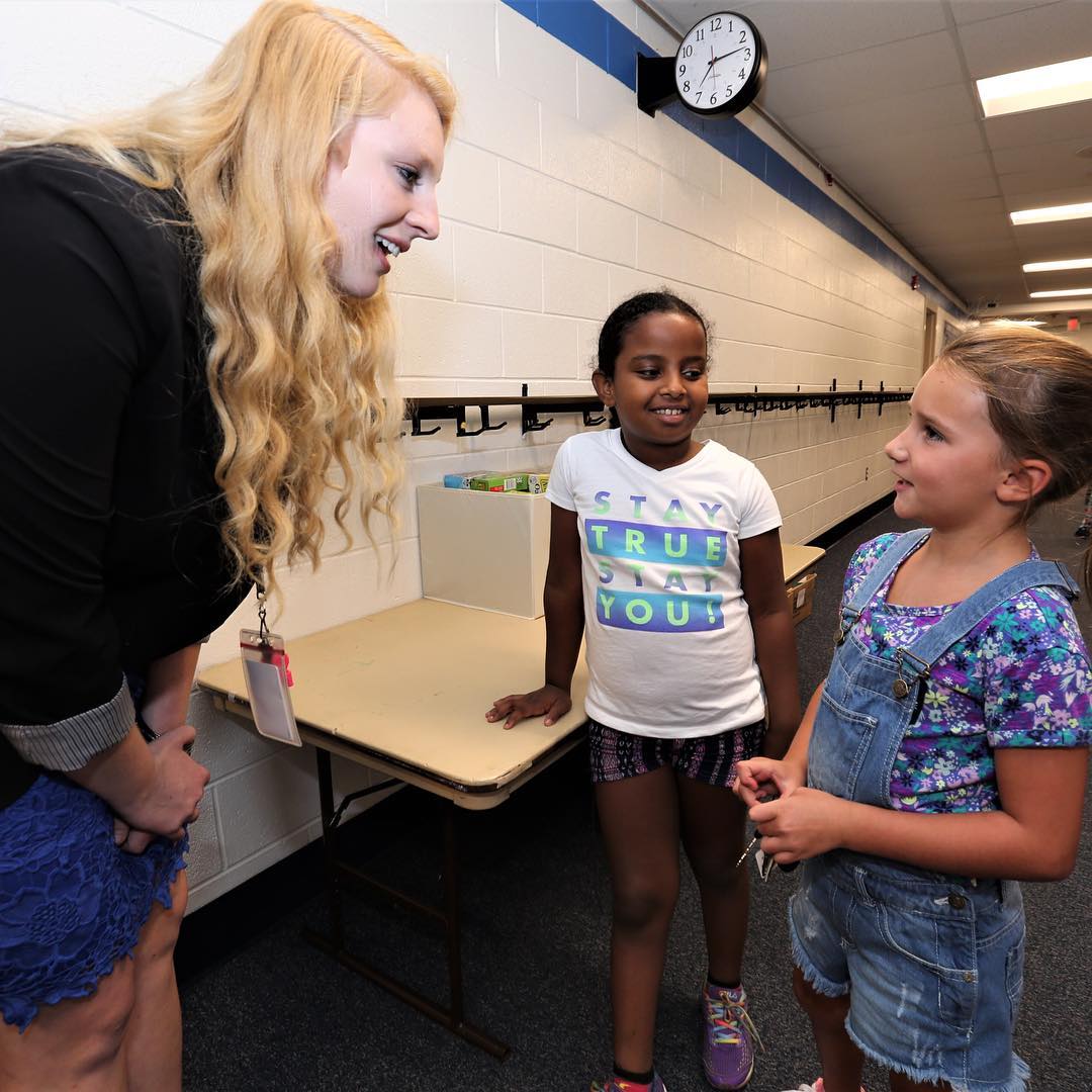 2B teacher Hannah Hale chats with students in the hallway during the meet-and-greet at ICS. The school year begins Monday, August 28th