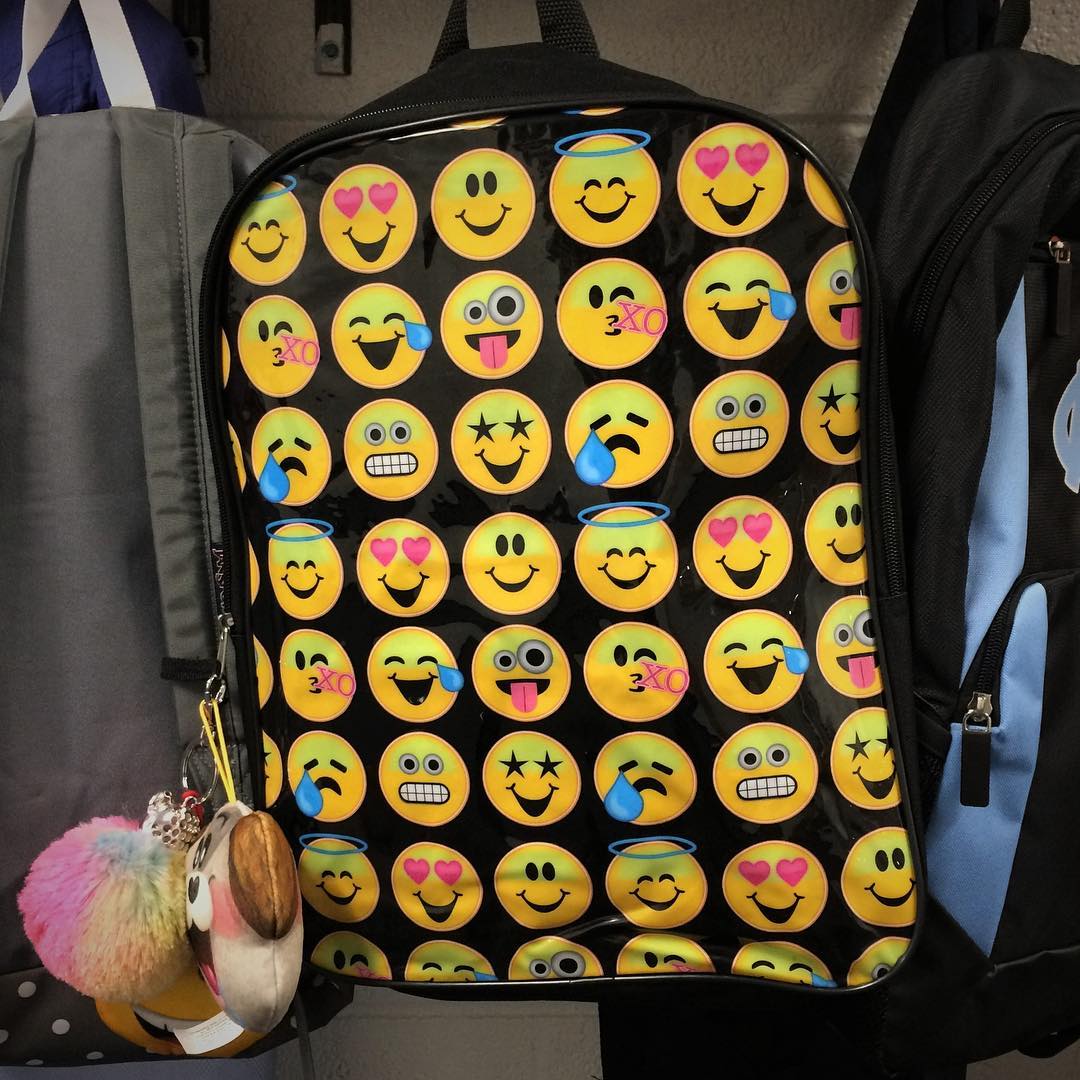 This student’s backpack sports an emoji for everyday of the school year, though we prefer a smiley face for most days