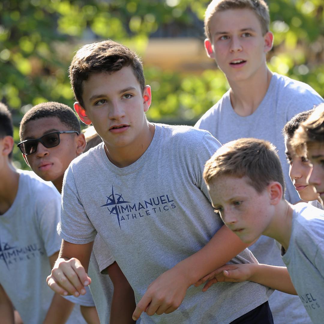 ICS student athletes prepare to compete in a multi-school cross-country meet