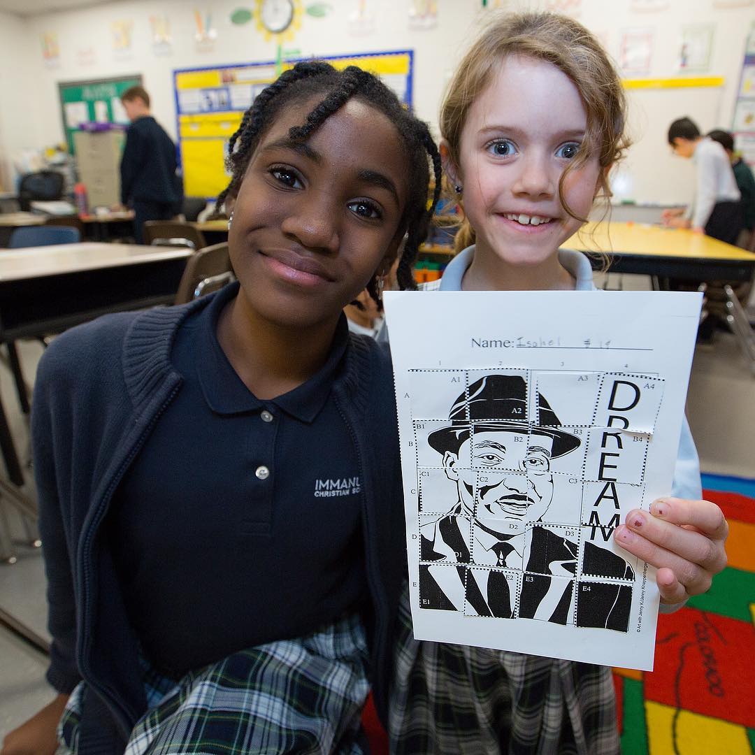 “Love is the key to the problems of this world.” Sixth graders celebrate the life and achievements of Martin Luther King Jr. with their second grade reading buddies