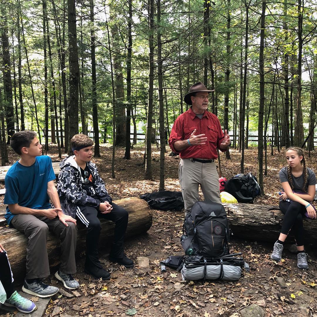 Our Head of School, Mr. Danish, talks to the 8th graders about how to pack their backpack for the hike ahead